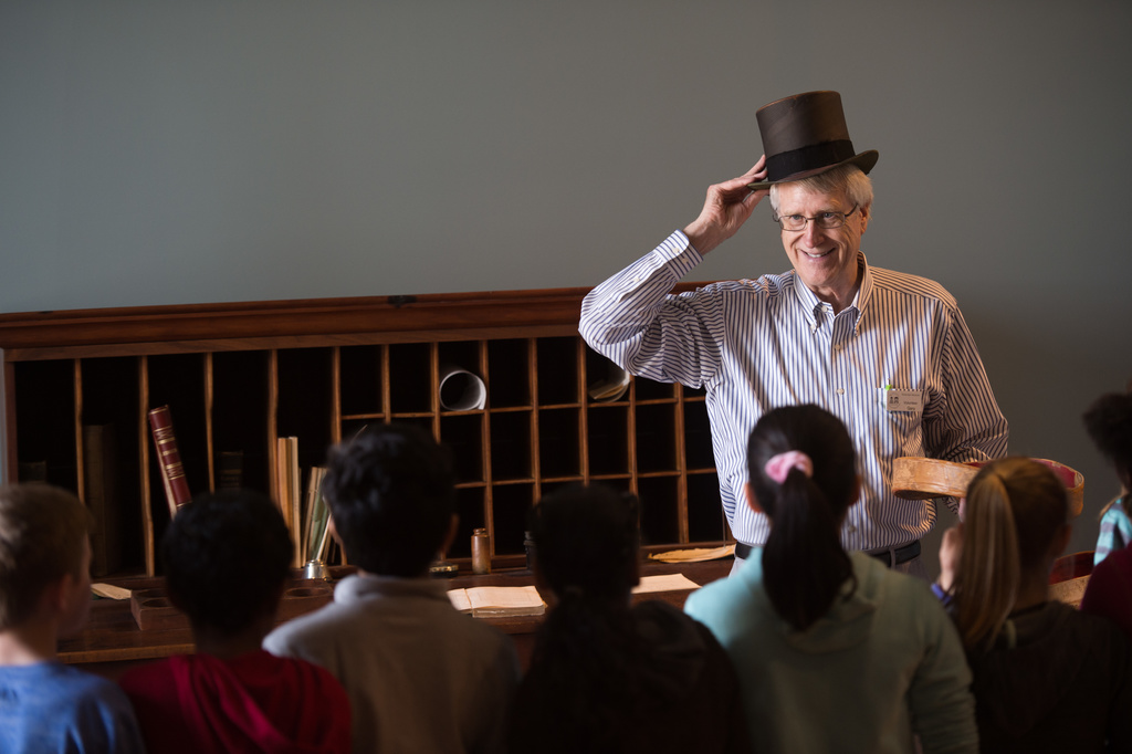 old capitol tour guide with top hat