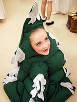 one young girls dressed as a tree in dressing room