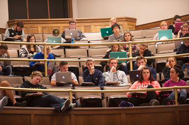 Students listening to lecture in Macbride Auditorium