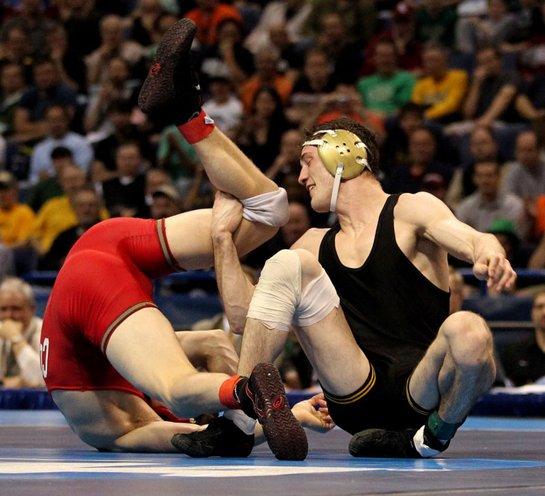 Derek St. John tangles with top-seeded Kyle Dake in the 157-pound final.