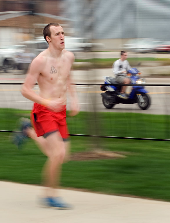 A runnner runs towards the finish line.