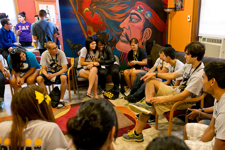 A group Iowa Edge students visit and play games at the Latino Native American Cultural Center.
