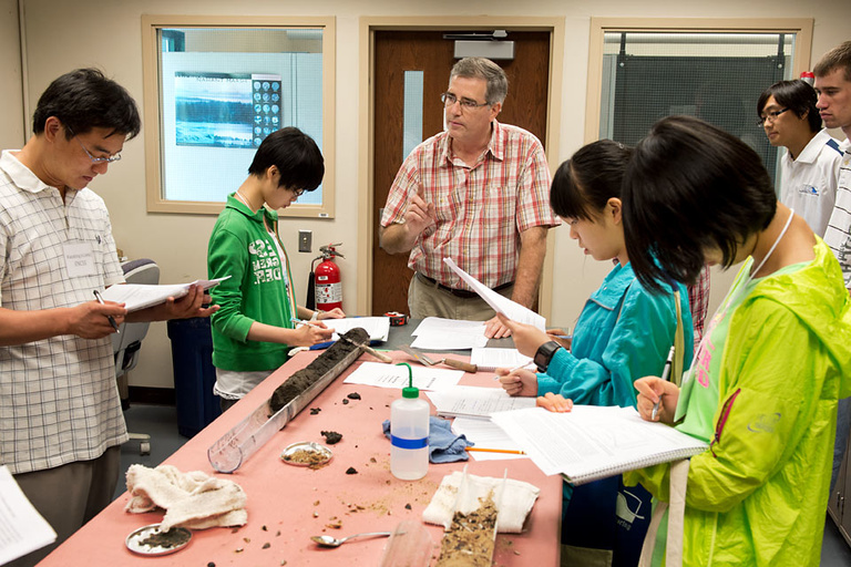Schnoebelen leads the students through exercises examining sediment cores