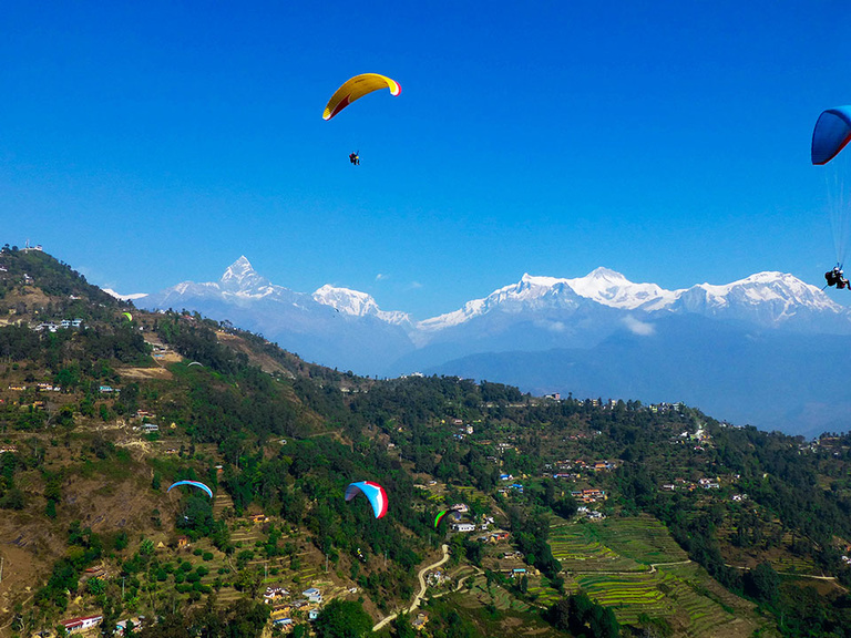 “Strapped to a yellow paraglider and a professional, I decided to jump off a mountain in Central Nepal and fly around over the Annapurna Range of the Himalayas,” said Sarah Steffens of her photo "Flying High." The image received first place in the Stu