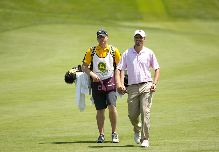Ihm and his caddy share a laugh.