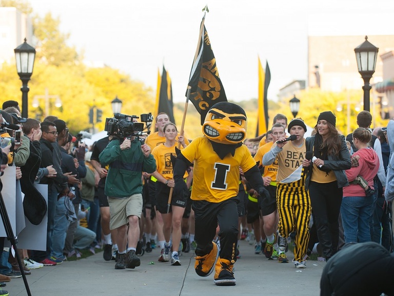 Herky leading a procession.