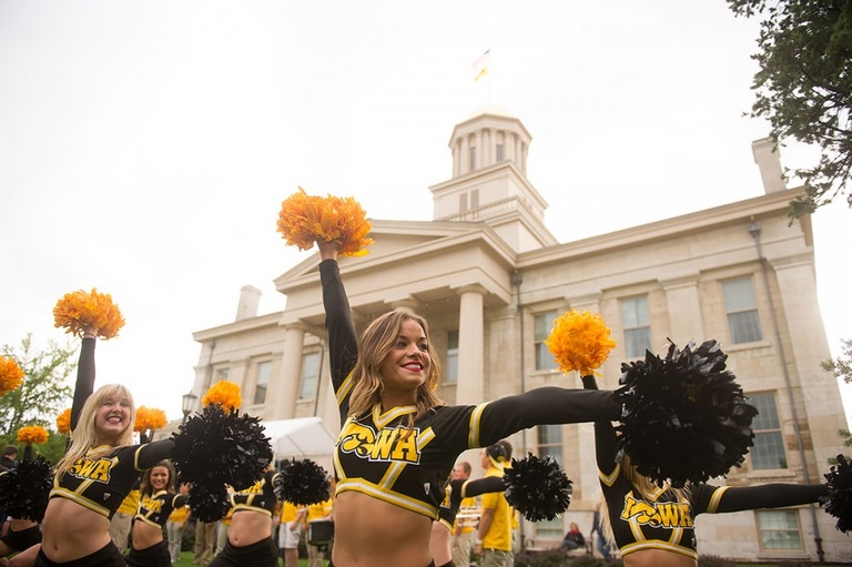 Cheerleaders in front of Old Capitol.