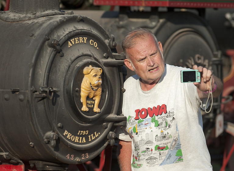 Kenny Parish, from Montpelier, Iowa, grabs a selfie with the Avery Company logo.