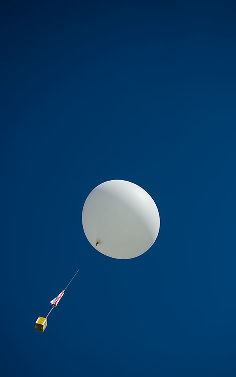 A balloon rises quickly.