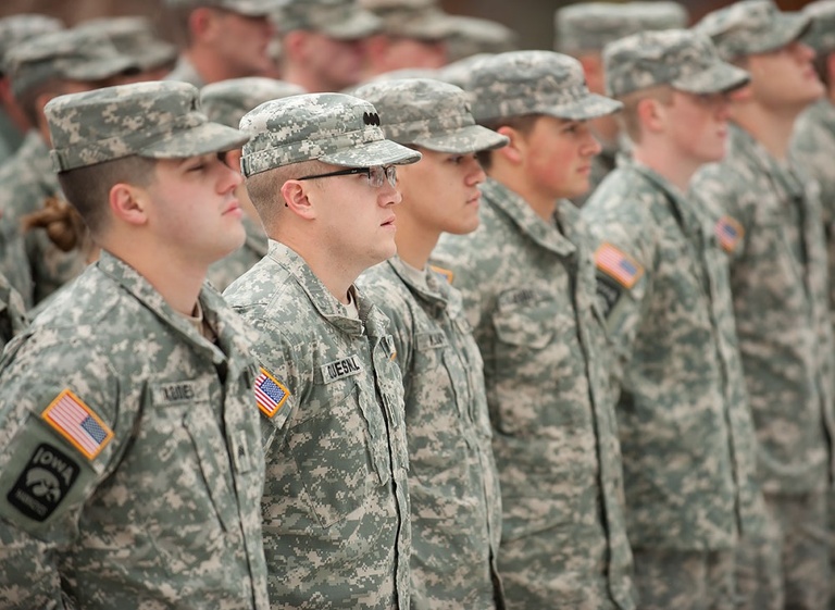 Army ROTC members line up for Veterans Day flag-raising