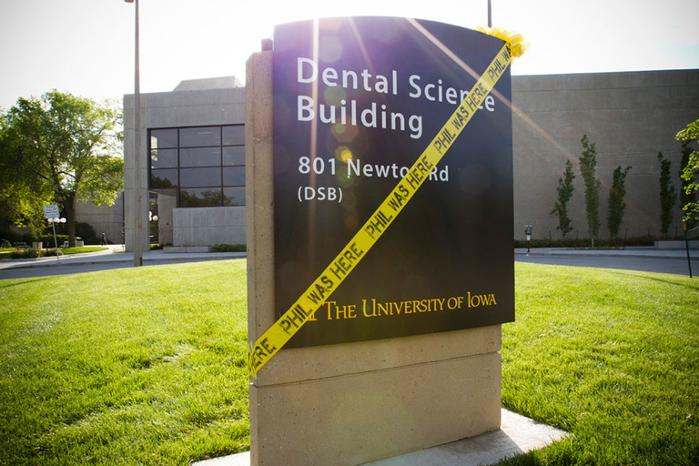 Dental Science Building sign tagged with Phil Was Here tape