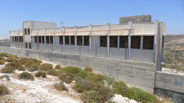 Primary school in Urif village in the north of the West Bank surrounded by cement walls