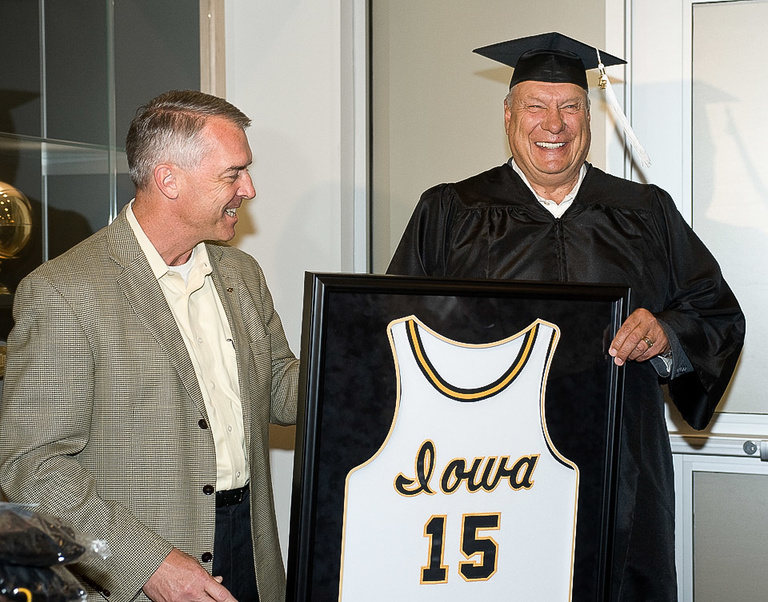 Don Nelson receives a framed jersey from Gary Barta
