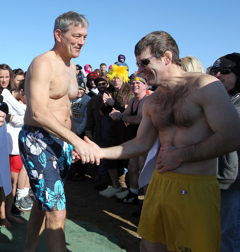 Kirk Ferentz and Tom Brands go for a freezing dip in the Iowa River