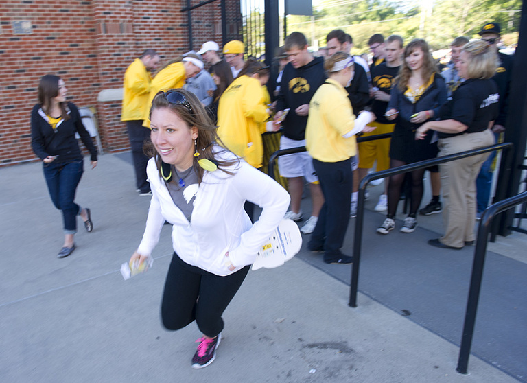 The first students rushing into the stadium.