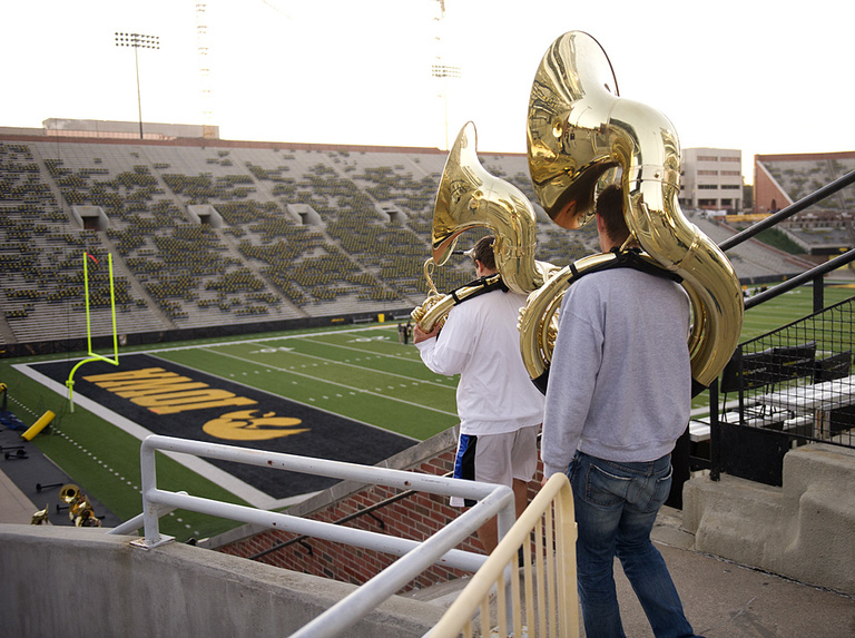 Tuba players arriving at the stadium for a 7 a.m. practice.