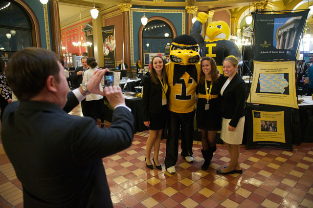 Posing for photos with Herky.