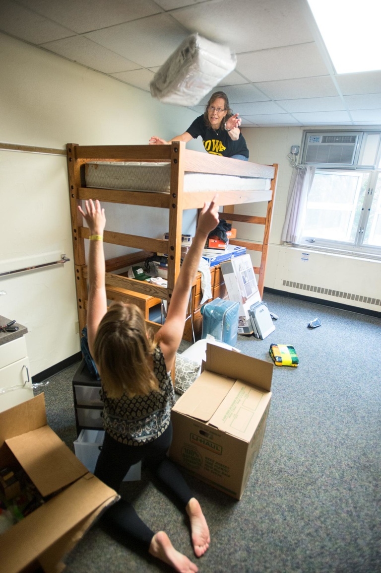New Dean of Students Lyn Redington helps her daughter, Amme, move into her residence hall. 