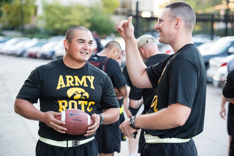 University of Iowa Army ROTC gathers in front of Kinnick Stadium for a photo before departing for the 28th annual Army ROTC Game Ball Run.