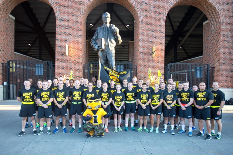 University of Iowa Army ROTC gathers for a photo in front of Kinnick Stadium before departing for the 28th Annual Game Ball Run on Friday, Sept. 11. Justin Torner