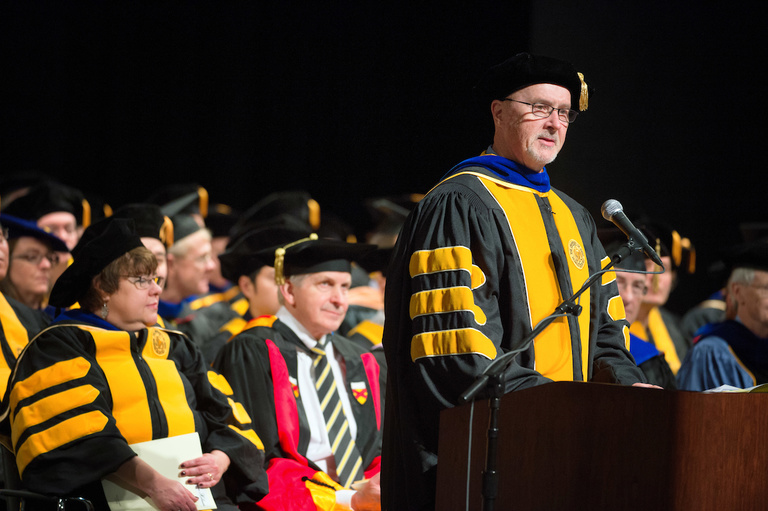 John C. Keller, associate provost for graduate and professional education and Dean of the Graduate College, speaks at the Graduate College commencement on Dec. 16.