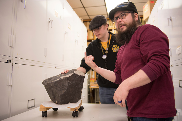 two students with the Tilden Meteorite.