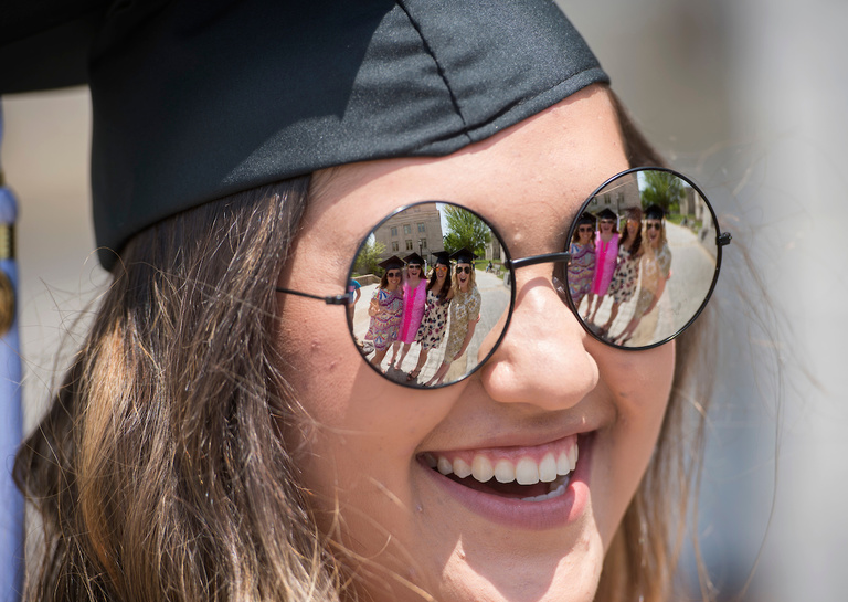 graduate wearing sunglasses