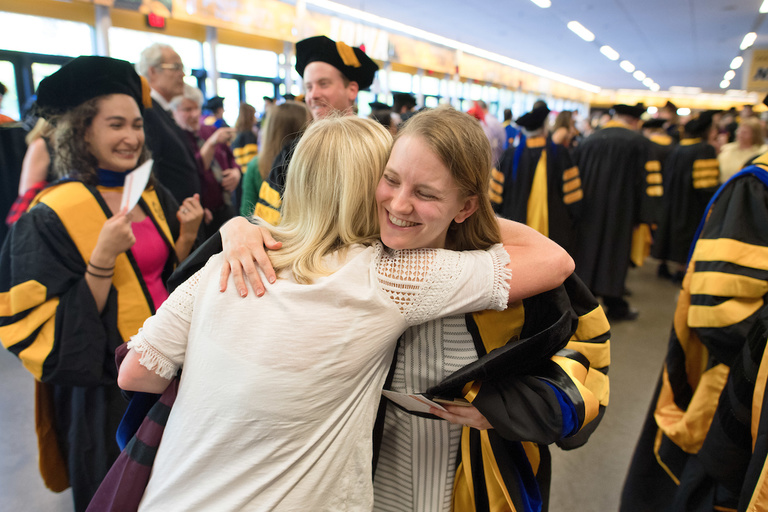 embracing at commencement