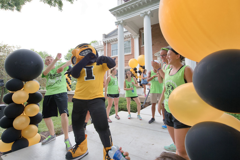 herky and students at block party