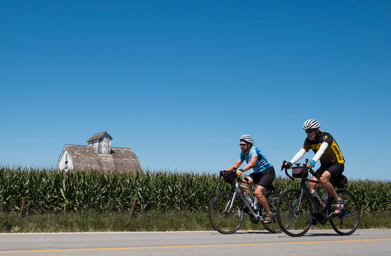 cyclists on country road during ragbrai 2018