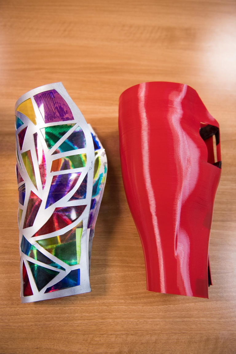 two of erica cole's prosthetic leg covers