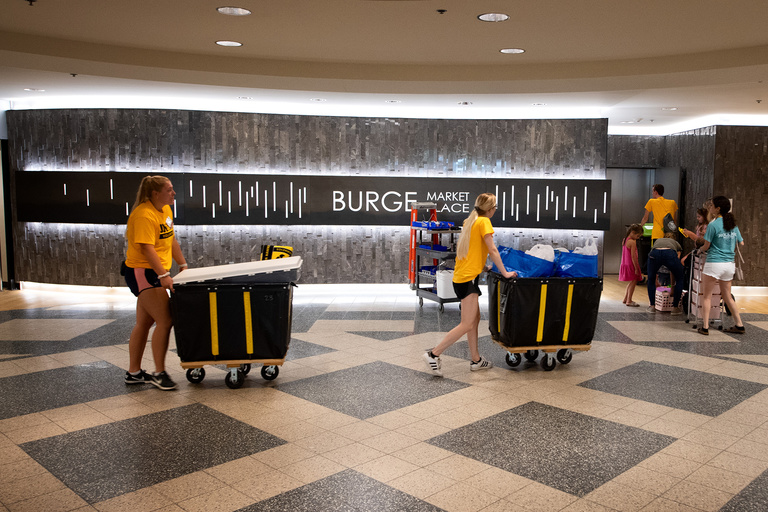 students roll into burge during on iowa move-in