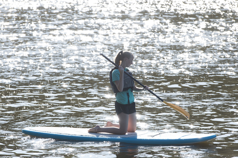 student on paddle board