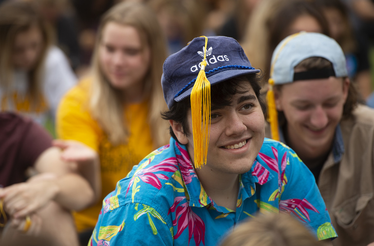 new student wears tassel on ball cap convocation and block party 2019