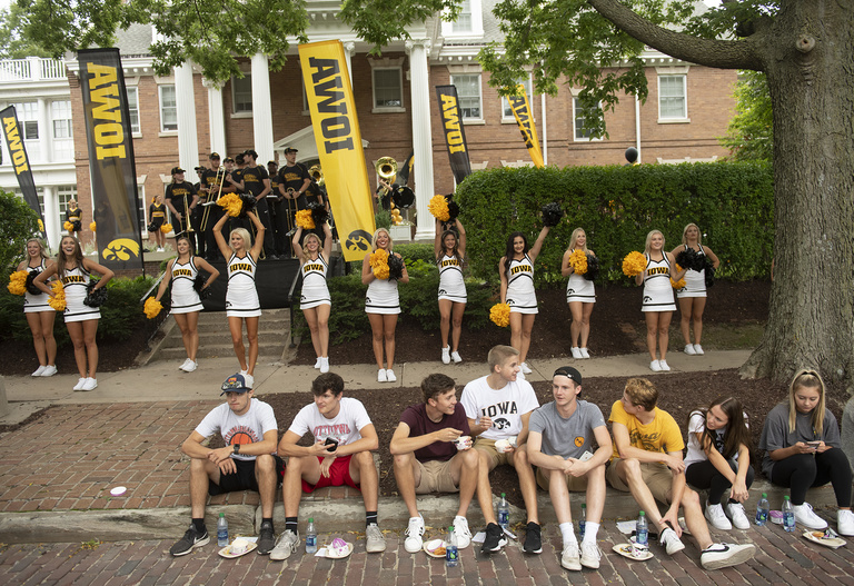 new students, spirit squad, and band in front of president's residence during convocation and block party 2019