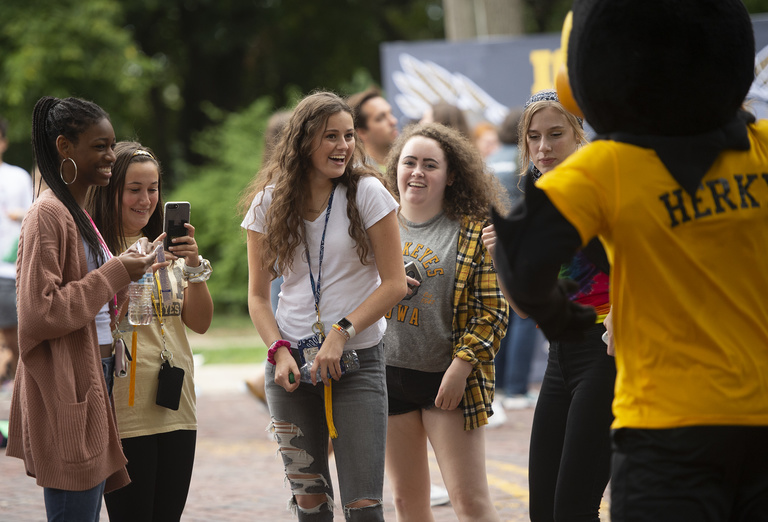new students meet and take photos with herky during convocation and block party 2019
