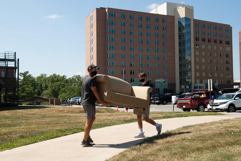 new students move a couch