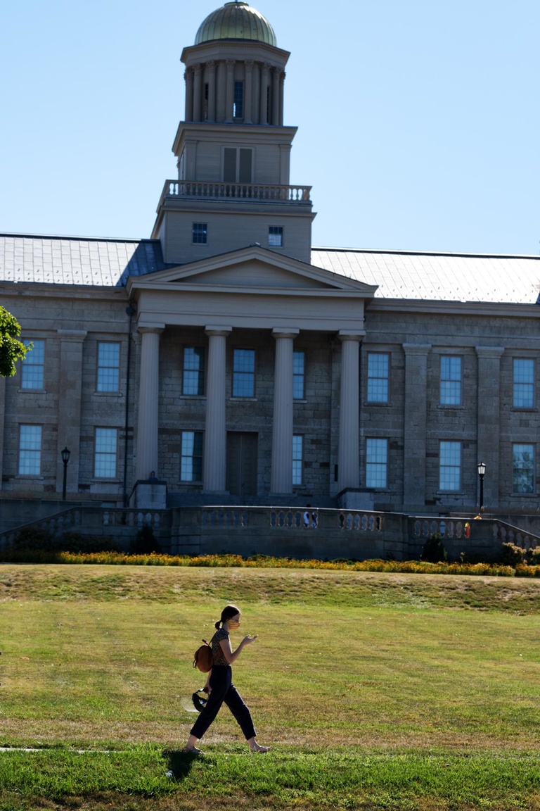 new student in front of old capitol