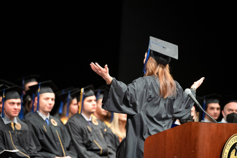 Graduates from the Tippie College of Business listen to a speech during their commencement ceremony. Photo by Justin Torner.