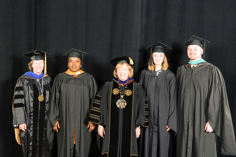 President Wilson poses with UI Shared Governance leaders, who took part in her official installation ceremony on Friday, Feb. 25, 2022. They are, L-R, Teresa Marshall, Faculty Senate president; Moala Bannavti, Graduate and Professional Student Government 
