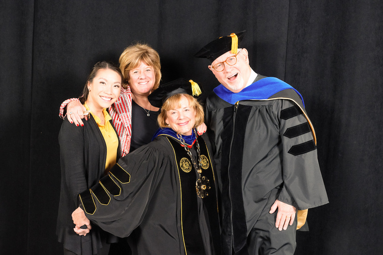 President Wilson is photographed with family members who attended her installation on Friday, Feb. 25, 2022, including daughter Isabel Lammers, sister Susan Wilson, and husband John Lammers.