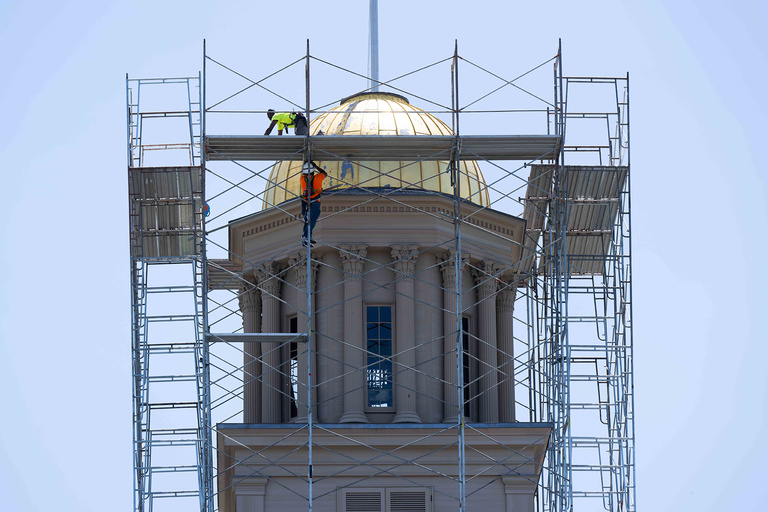 A view from the side of the Old Capitol where workers were installing the scaffolding to regild the dome.