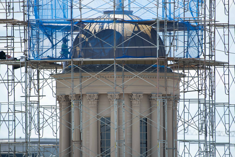 A view of the dome as workers begin the project of regilding the gold on the dome.