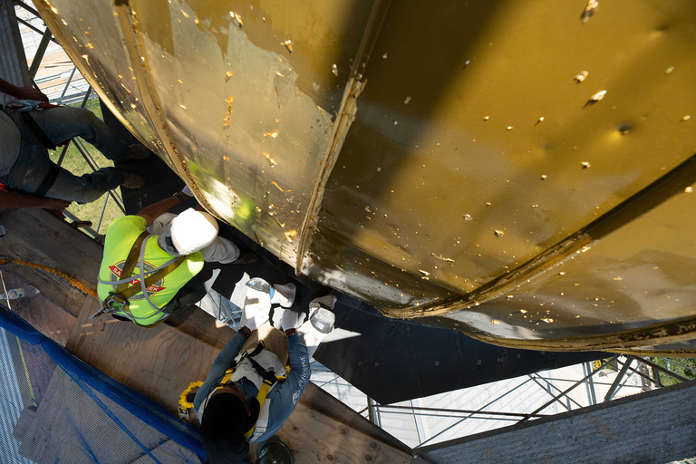 After much study and discussion in the spring, it was recommended that the most cost-effective and long-term solution to restoring the failing gold leaf was to regild the dome this summer.