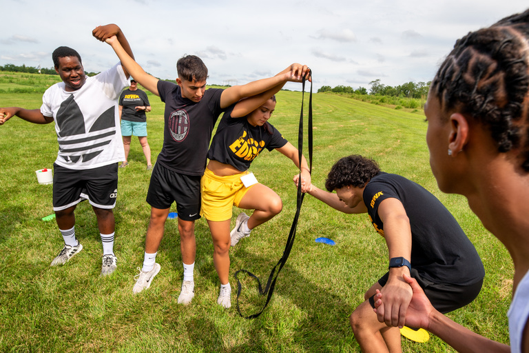 Students take part in the Iowa EDGE teambuilding activity at the Ashton Cross Country Course.