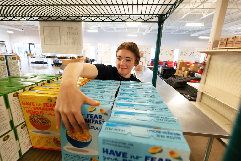 Students in the College of Public Health participated in a day of service by volunteering at the CommUnity Food Bank in Iowa City.