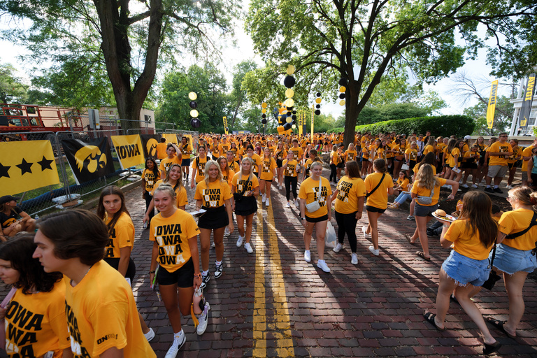 Students pack Church Street during the OnIowa! Block Party.