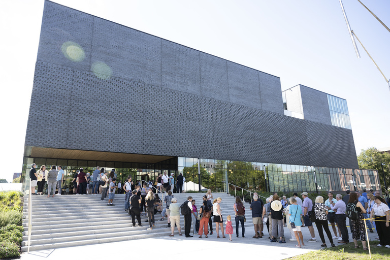 After 14 years, visitors line up outside the new UI Stanley Museum of Art on its opening day.