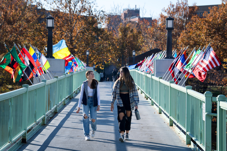 Iowa's Bridging our World flag display was installed on the Iowa River bridge outside of the Iowa Memorial Union as part of the 2022 homecoming festivities.