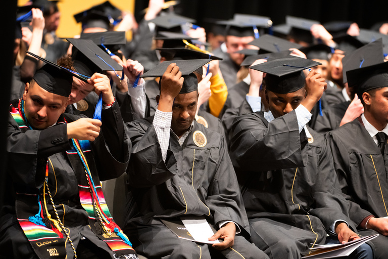 These students become official graduates of the University of Iowa by turning their tasslels from right to left.